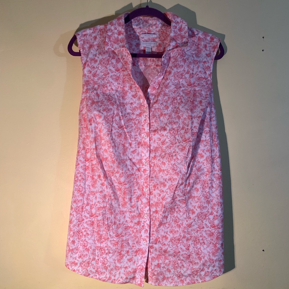 Sleeveless button down in floral print.